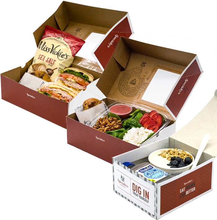 Description of boxed lunch.  Breakfast box: pastry + juice.  Sandwich box: sandwich + chips + cookie.  Salad box: salad + focaccia + cookie
